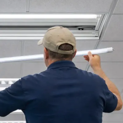 Installater who connects a LED tube light